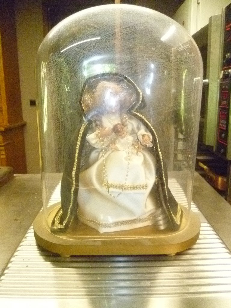 Mariabeeld onder stolp, Ophalen