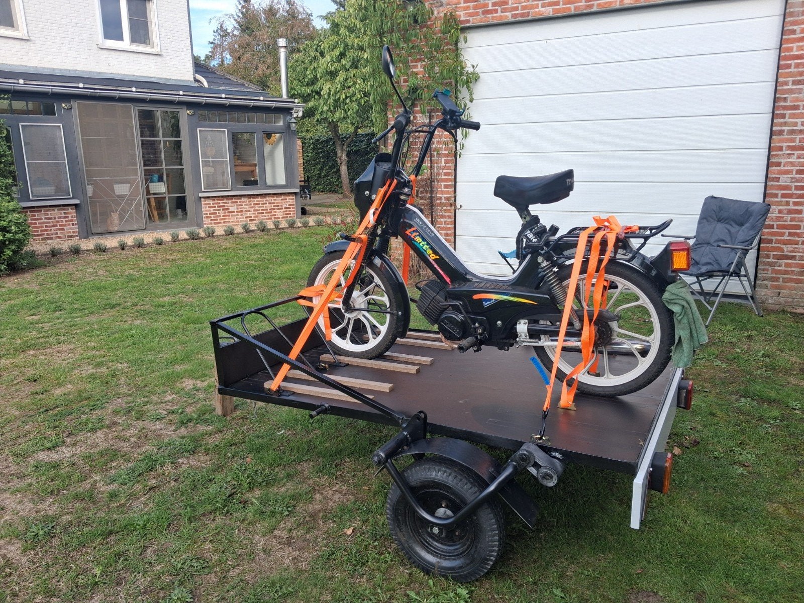 aanhangwagen voor bromfietsen of scooters, Ophalen