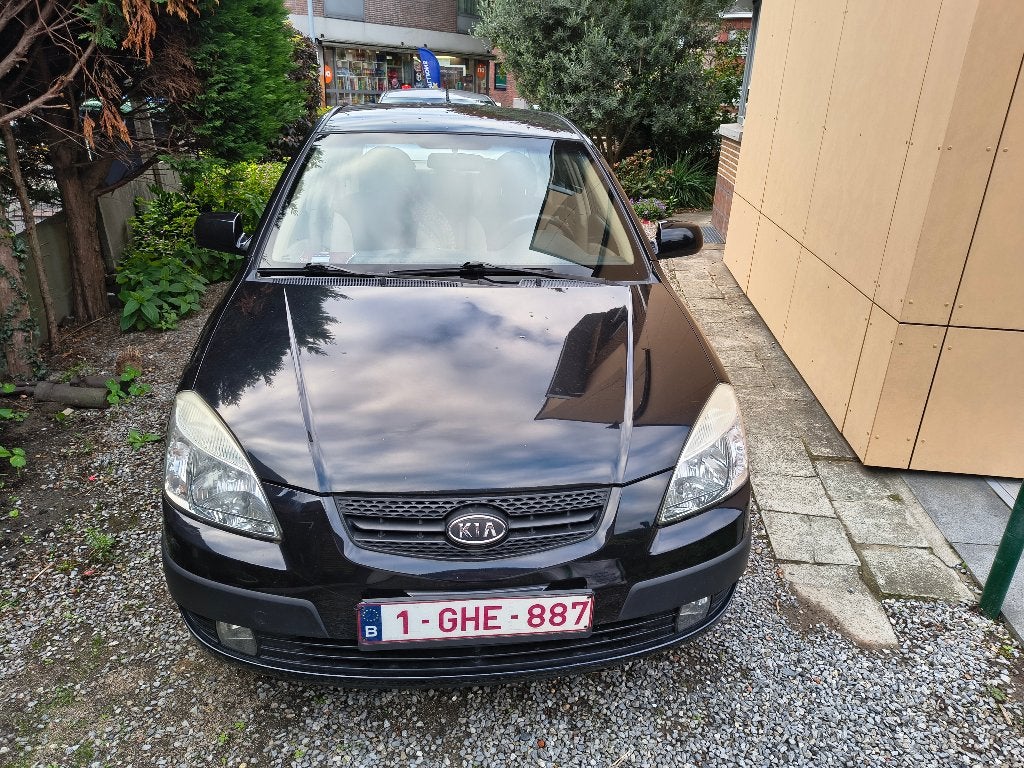 Kia Rio 15 CRDi EX, Auto's, Stof, Beige, 4 cilinders, Zwart