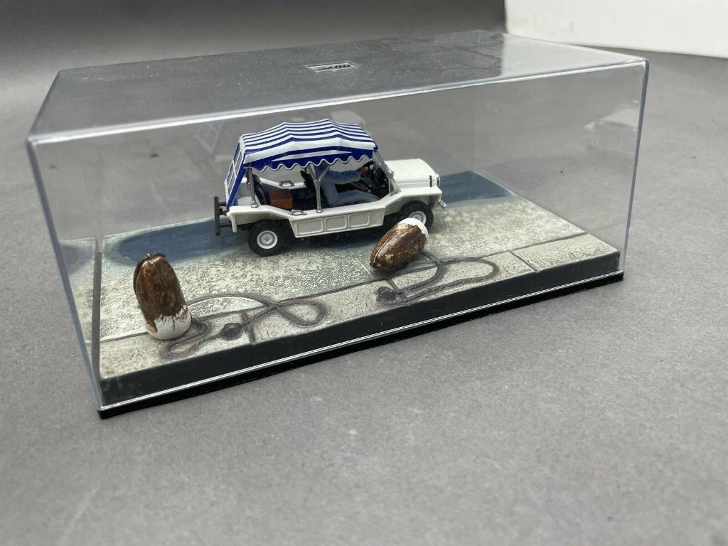 AUSTIN Mini Moke 1964 JAMES BOND 1/43 UH IXO NEUVE + BOITIER, Enlèvement ou Envoi, Neuf, Voiture, Universal Hobbies