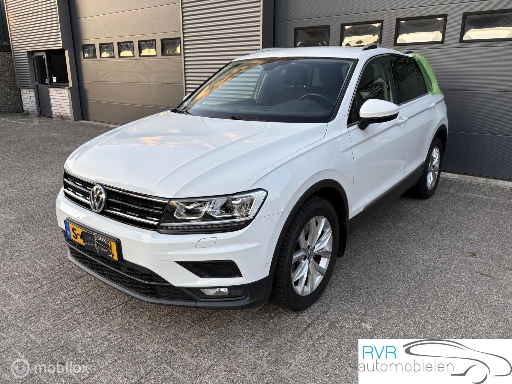 Volkswagen Tiguan 2.0 TSI 4Motion Highline, Autos, Achat, Alarme, Carnet d'entretien, Noir