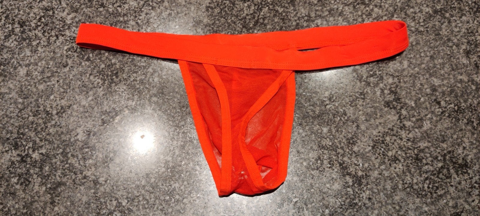 transparante string l-xl, Enlèvement