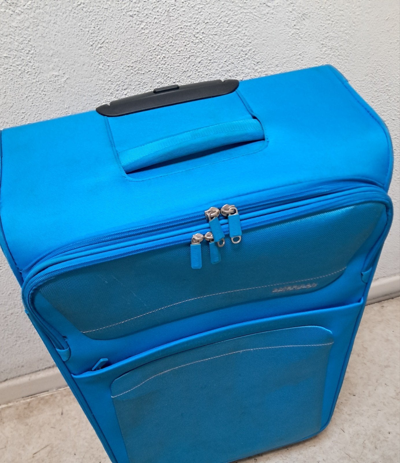 AMERICAN TOURISTER grote valiezen, Ophalen