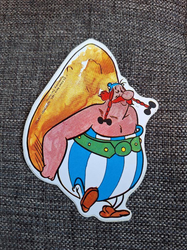 Goscinny Uderzo - Sticker Obelix Rodekoratie (1983), Ophalen of Verzenden, Asterix en Obelix, Zo goed als nieuw, Plaatje, Poster of Sticker
