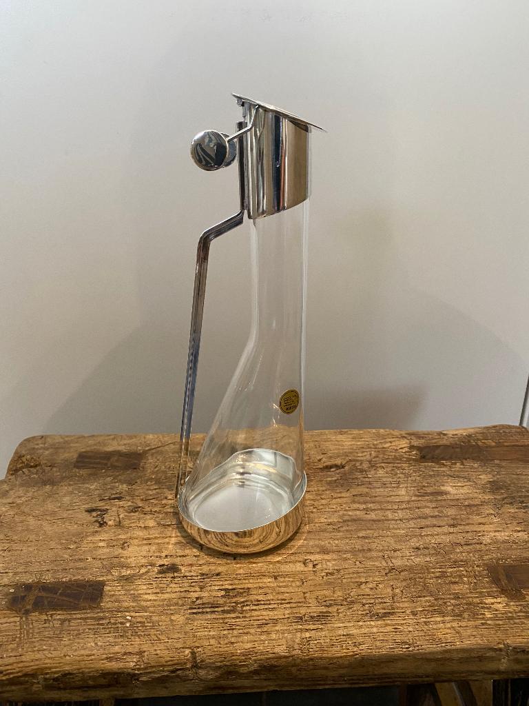 Verzamelobject van Alessi: oliekan in verzilverde houder, Ophalen, Zilver