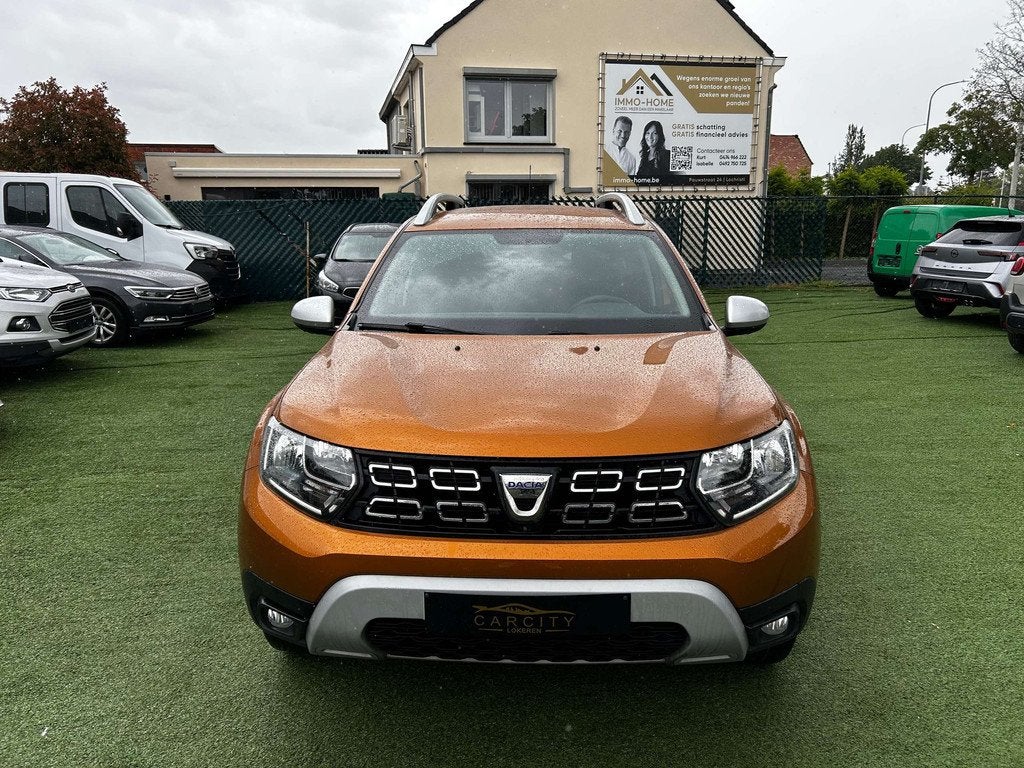 Dacia Duster 1.3 TCe 4X4 Prestige CARPLAY  CAMERA GPS, Auto's, 1849 kg, Stof, Gebruikt, 4 cilinders
