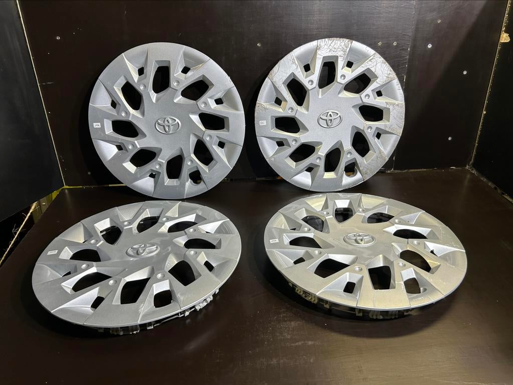 4 enjoliveurs Toyota aygo yaris corolla 15", Enlèvement ou Envoi, Comme neuf