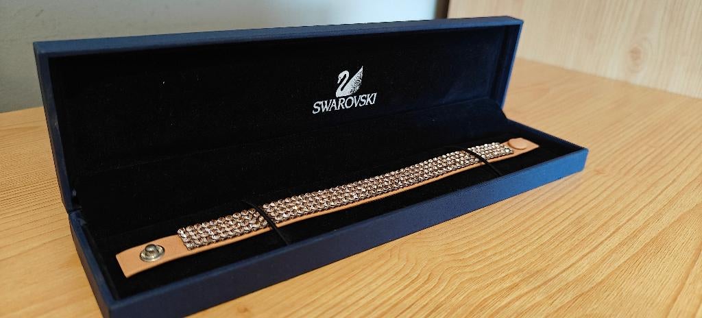 Bracelet beige clair Swarovski, Ophalen, Zo goed als nieuw, Sieraad of Horloge