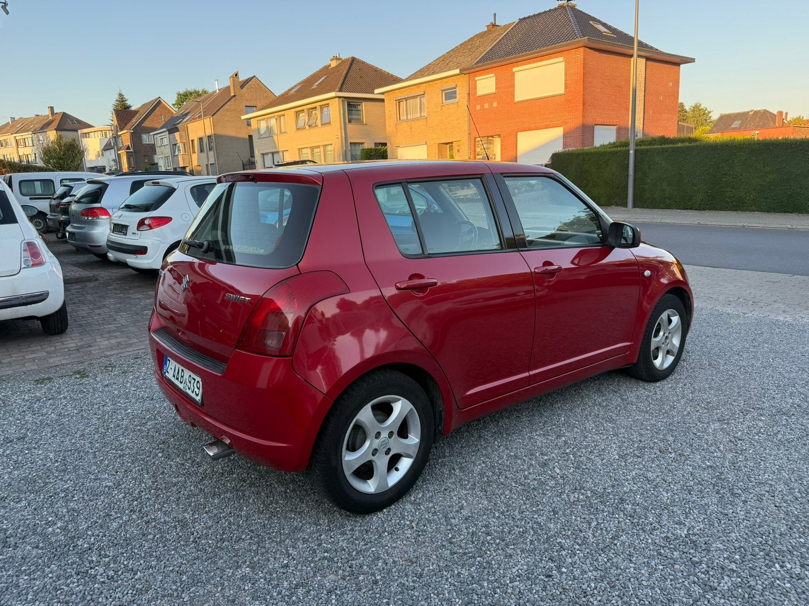 Suzuki Swift 1.3GLX AIRCO, Autos, Suzuki, Rouge, Boîte manuelle, Tissu, Euro 4