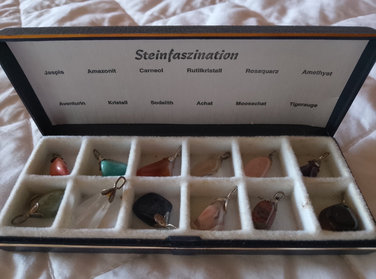 verzamelingsset zilveren hangers met halfedelstenen, Ophalen