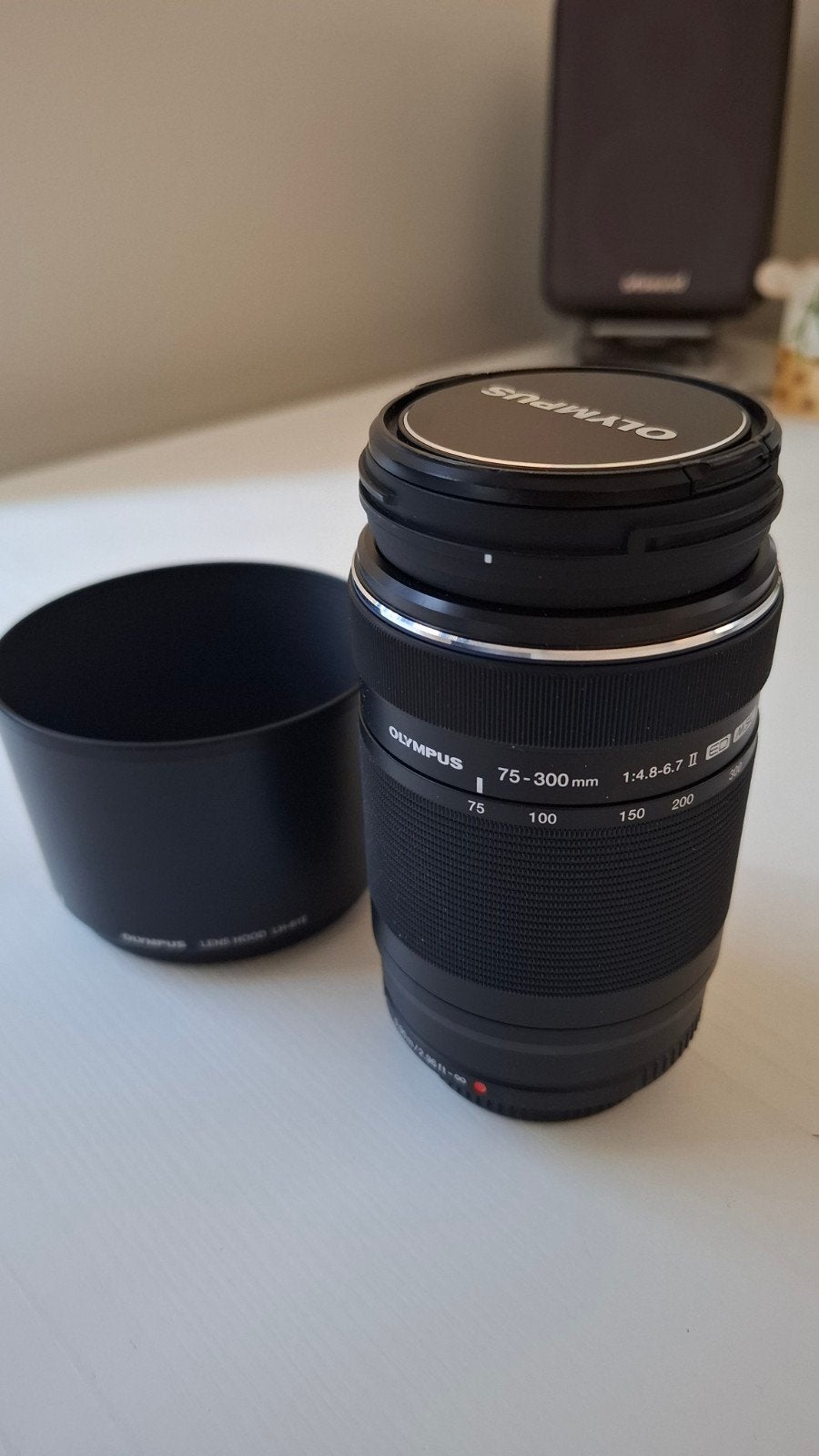 Olympus 75-300mm f4.8-6.7 mark II, Ophalen, Micro Four Thirds, Lensdoppen, Olympus