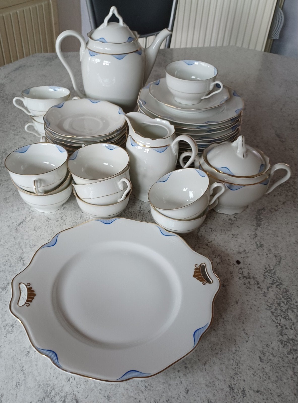twaalf delig koffieservies met motief., Ophalen