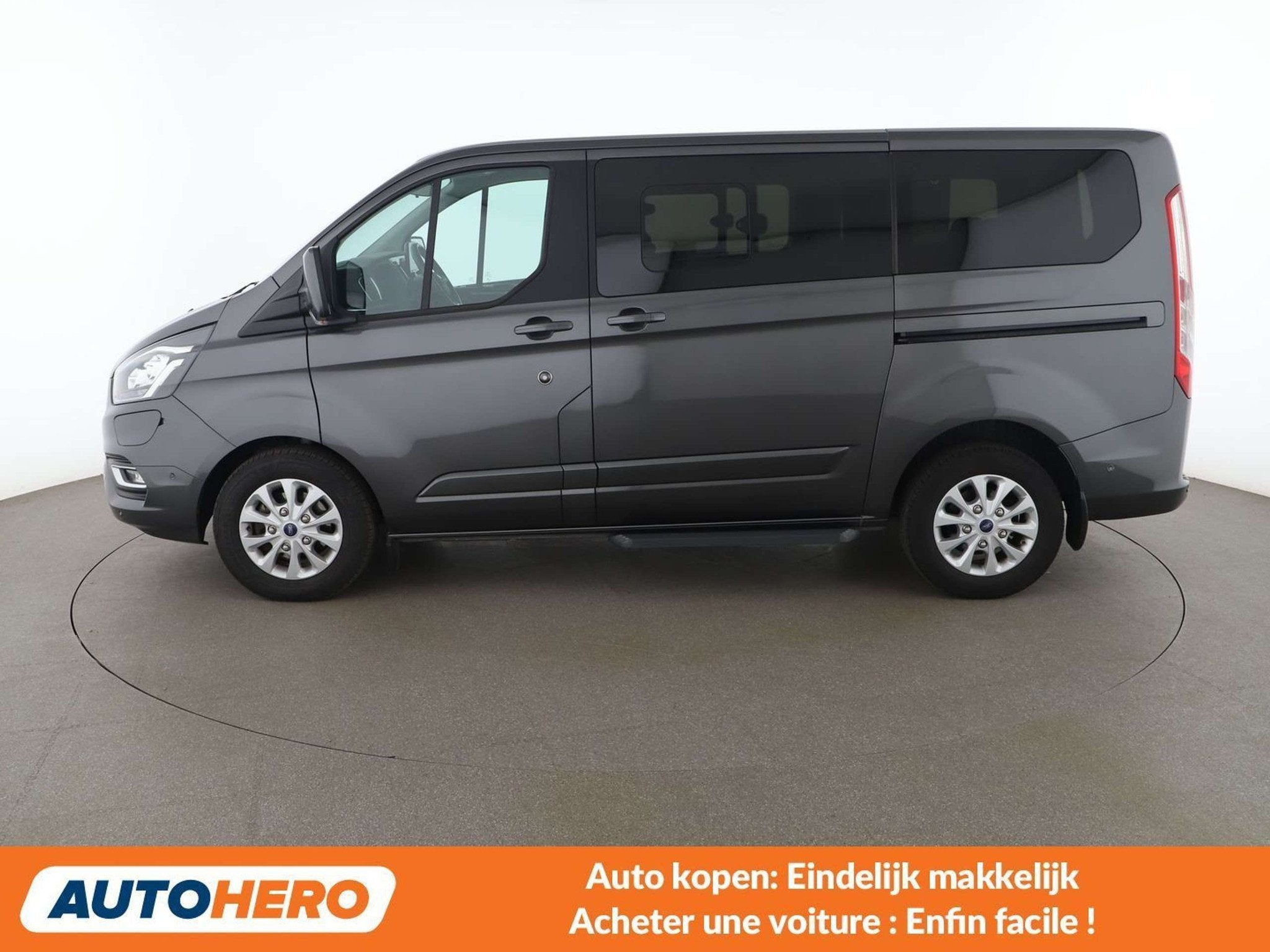 Ford Tourneo Custom 1.0 Plug-in Hybrid 320 L1 Titanium, Auto's, Parkeerassistent, 70 g/km, Gebruikt, Leder