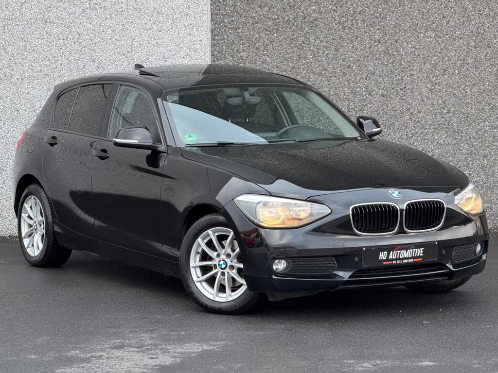 BMW 116i Automaat – Airco – PDC – Open Dak – 12M Garantie, Zwart, 4 cilinders, Zwart, 5 zetels