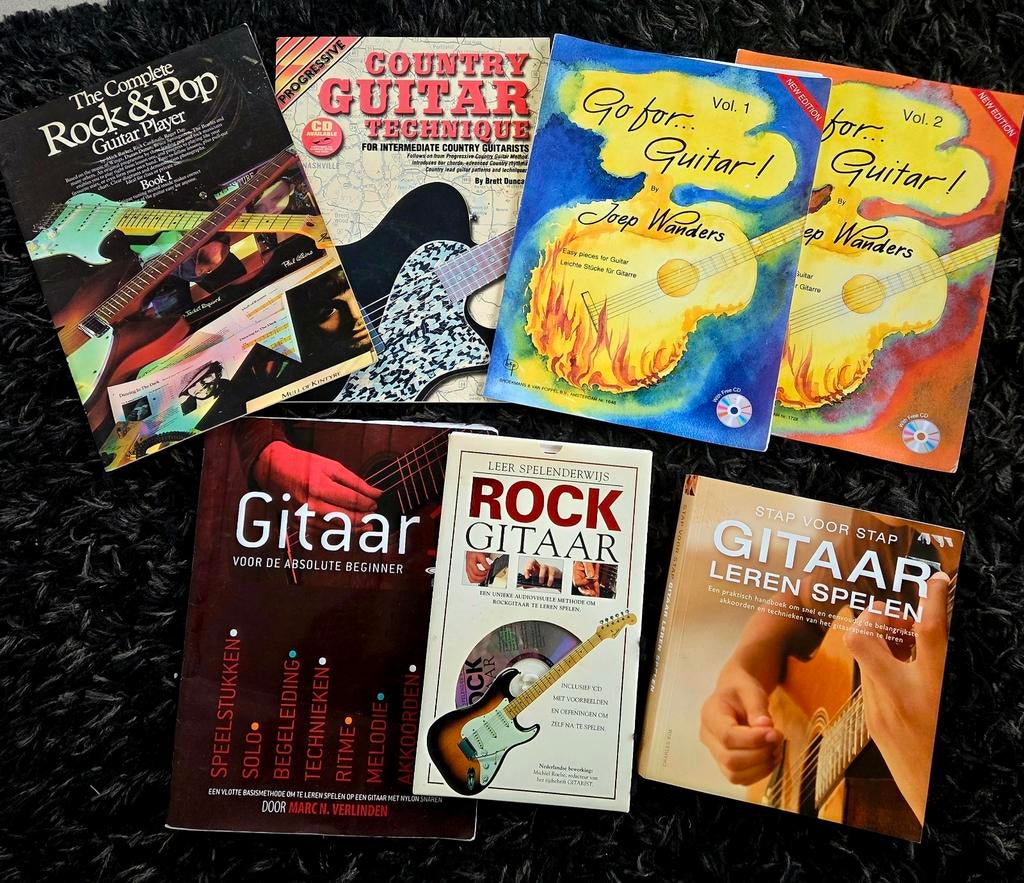 Leer gitaar spelen! 7 boeken met CD en 1 dvd!, Boeken, Ophalen of Verzenden