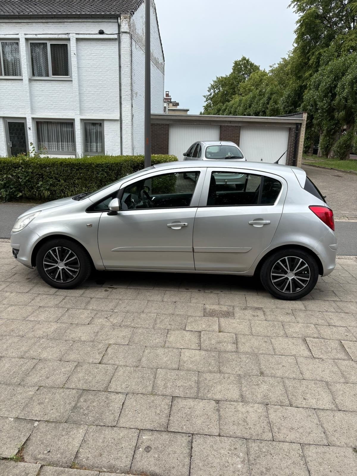 Opel corsa 1.2 benzine bouwjaar 2007 km 214000, Auto's, Stof, Zwart, Elektrische ramen, Bedrijf