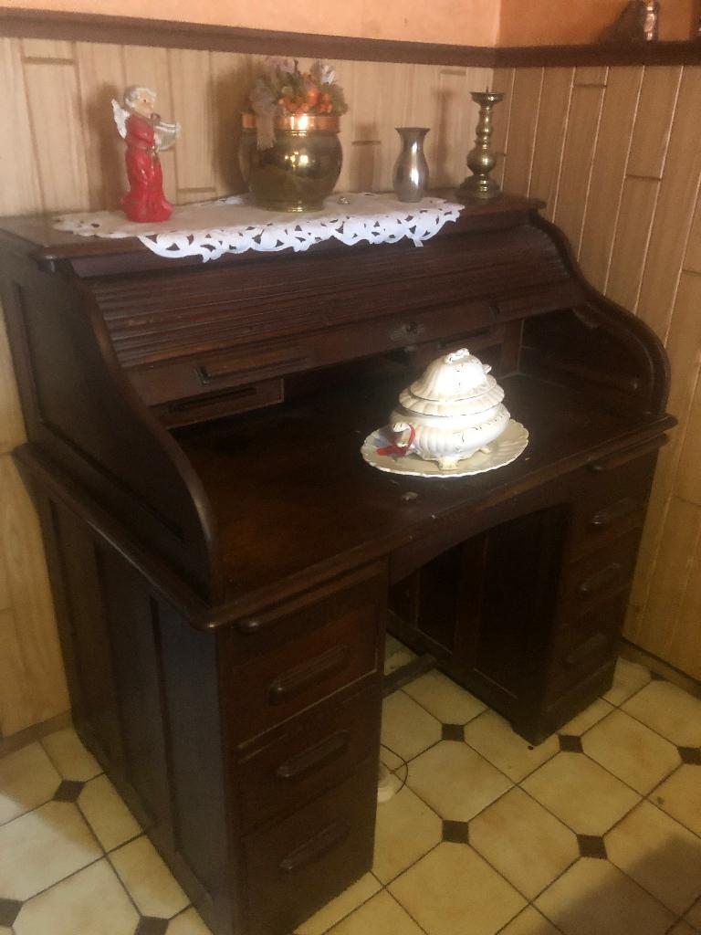 lessenaar bureau, Ophalen