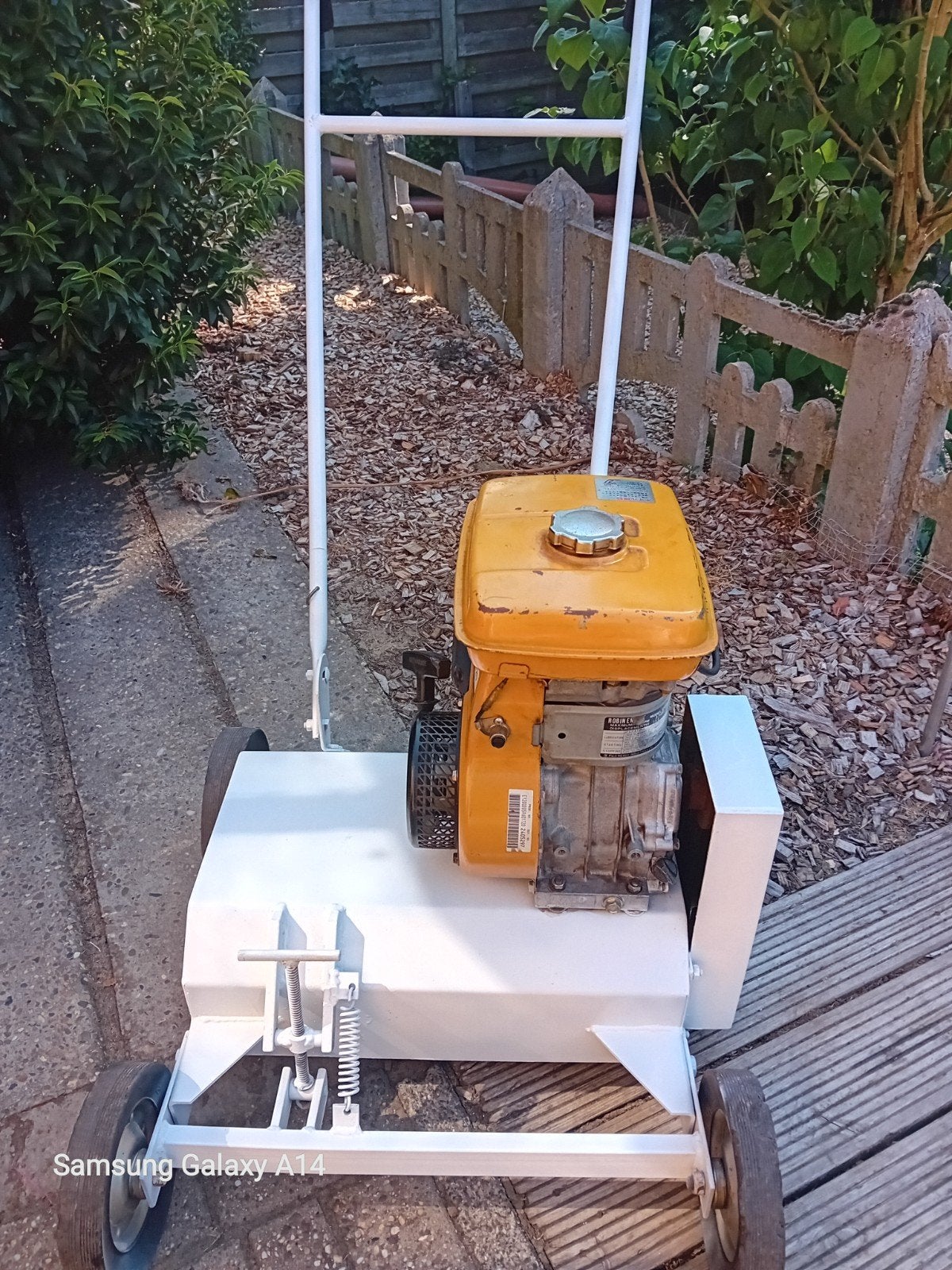 verticuteermachine benzine, Ophalen