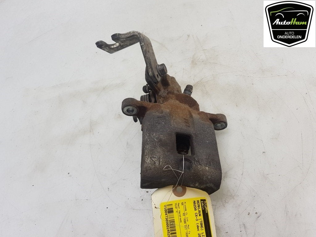 REMKLAUW LINKS ACHTER ABS CX-3 (DJ / DK) (|D1Y12699Z|), Auto-onderdelen, Hitdorfer Straße 73
51371  Leverkusen, DE, Gebruikt, Mazda