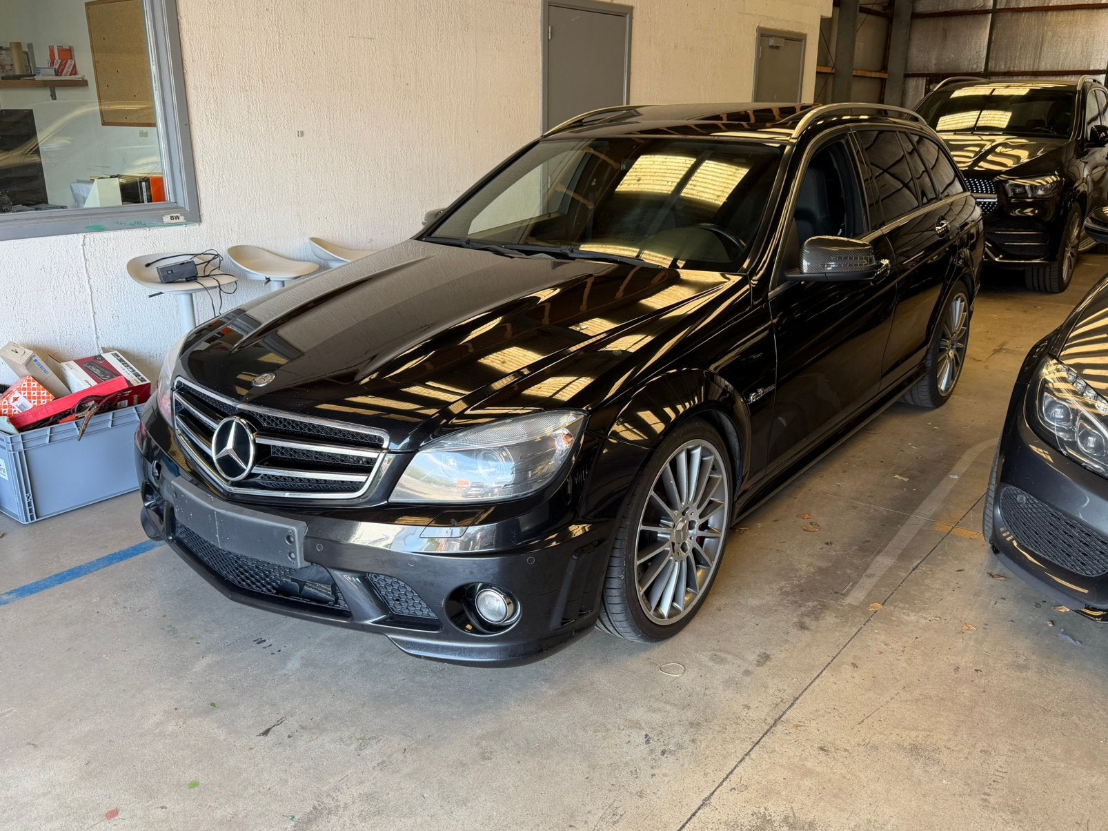 Mercedes C63 AMG Lichte vracht 2009 190.000Km, Automaat, 6299 cc, 336 kW, Zwart