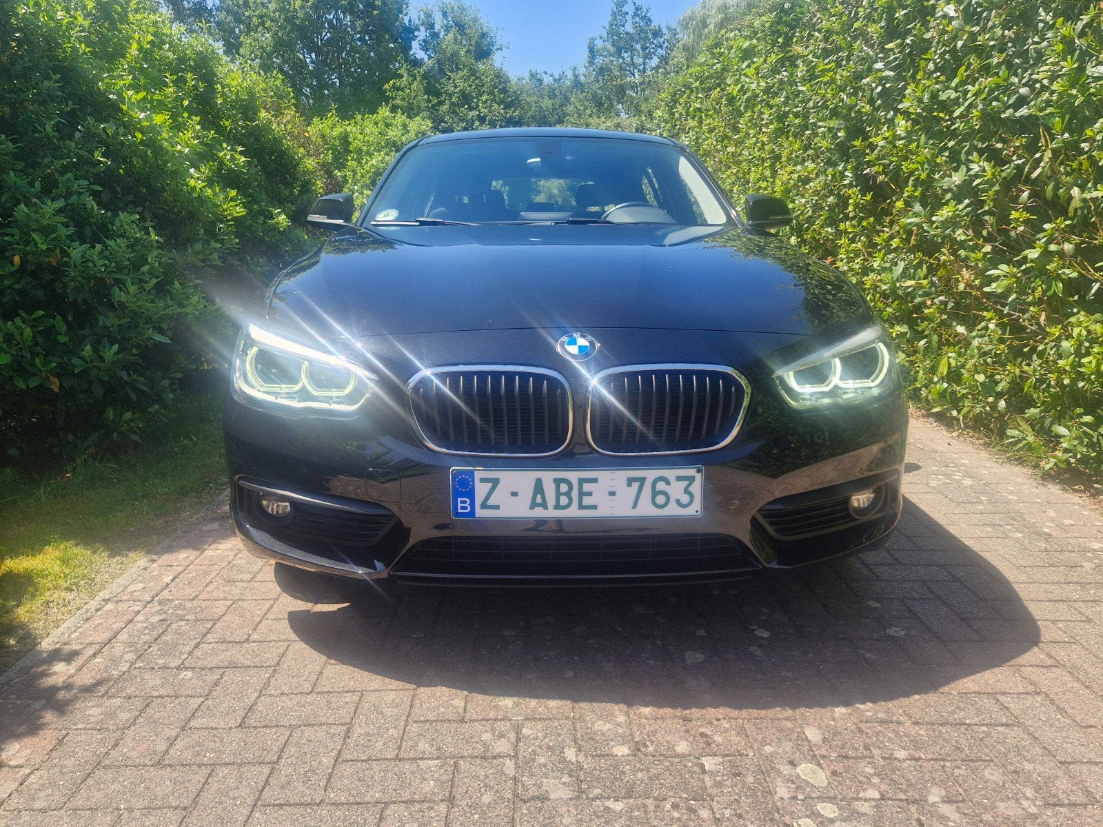 Bmw 116i 2016 euro6 benzine 94dkm gekeurd en 1jgarantie, Auto's, Zwart, Electronic Stability Program (ESP), 5 deurs, 3 cilinders
