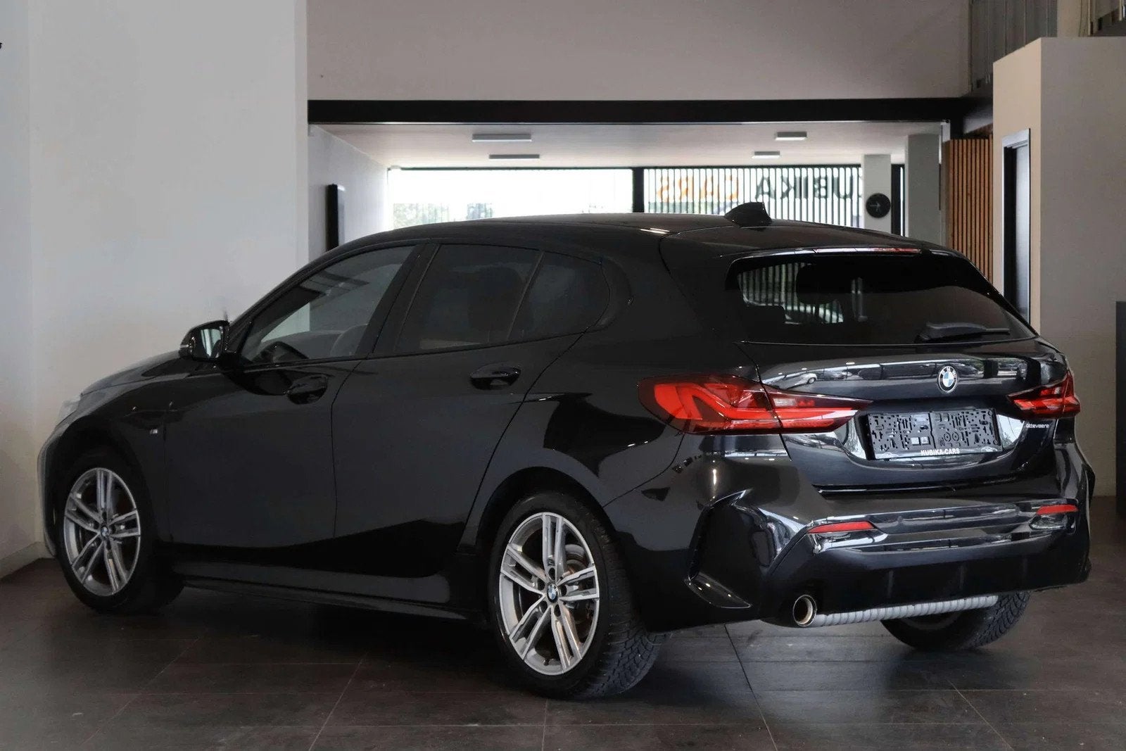 BMW 1 Serie 116 116iA OPF M-Pack Navi CruiseC Leder Garantie, Auto's, Automaat, 116 g/km, 1 Reeks, Gebruikt