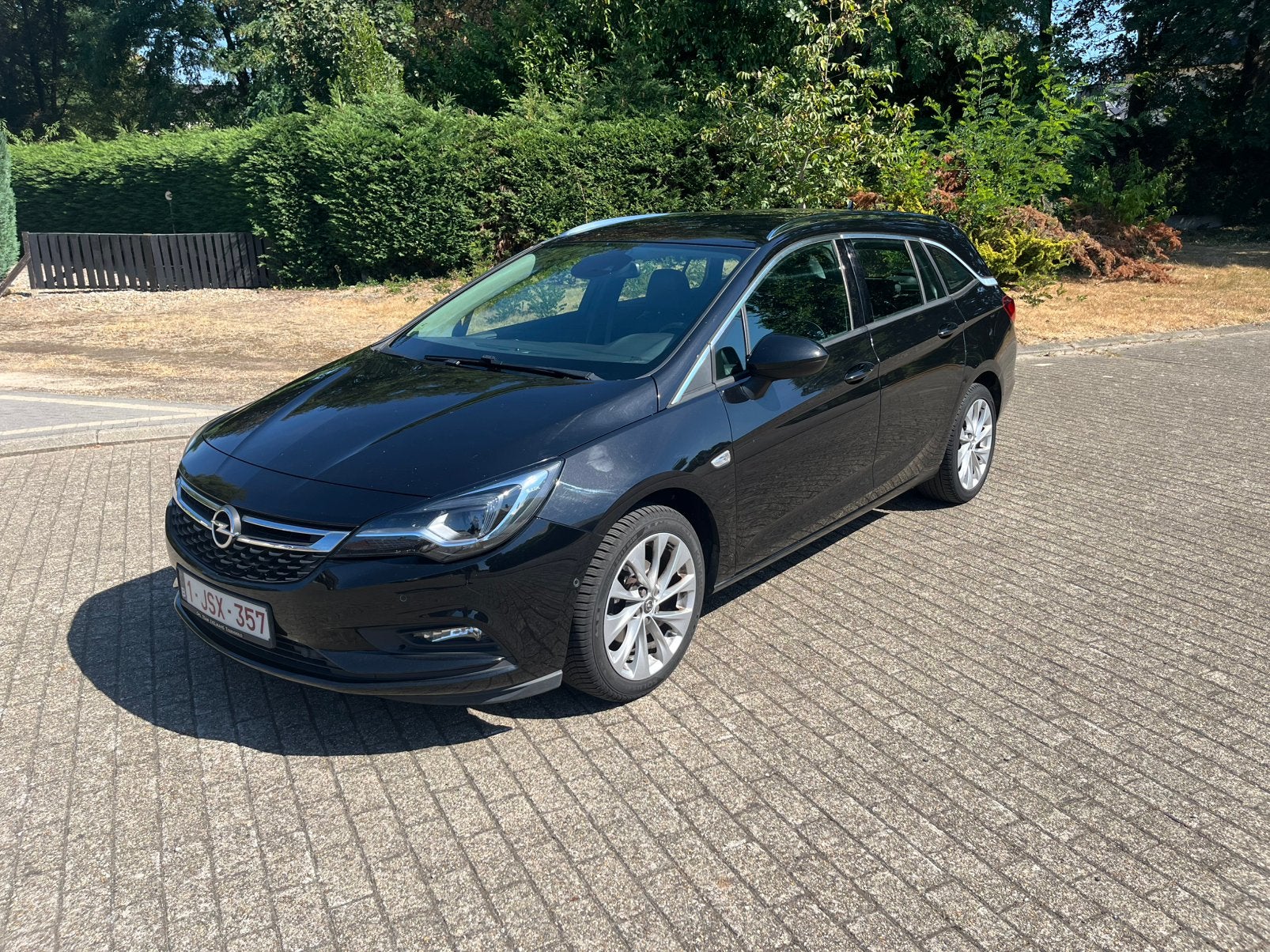 Opel Astra K Sports Tourer Innovation 1.4 Turbo – 150 pk, Auto's, Voorwielaandrijving, Zwart, Zwart, Leder