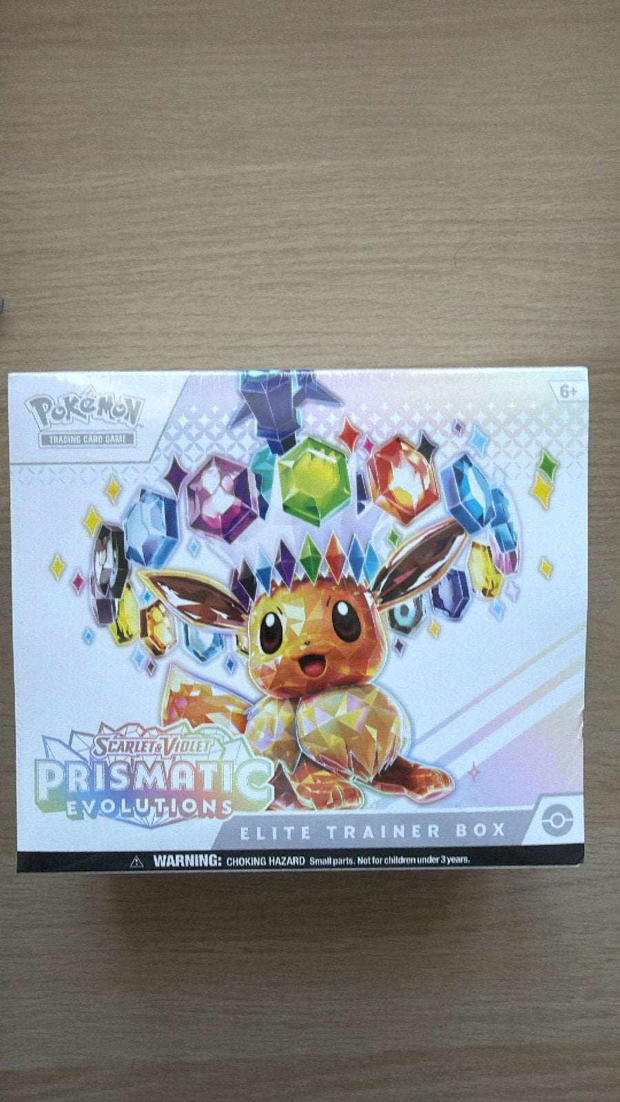 ETB Prismatic evolutions !, Kinderen en Baby's, Speelgoed | Kinderpuzzels, Ophalen of Verzenden, Zo goed als nieuw