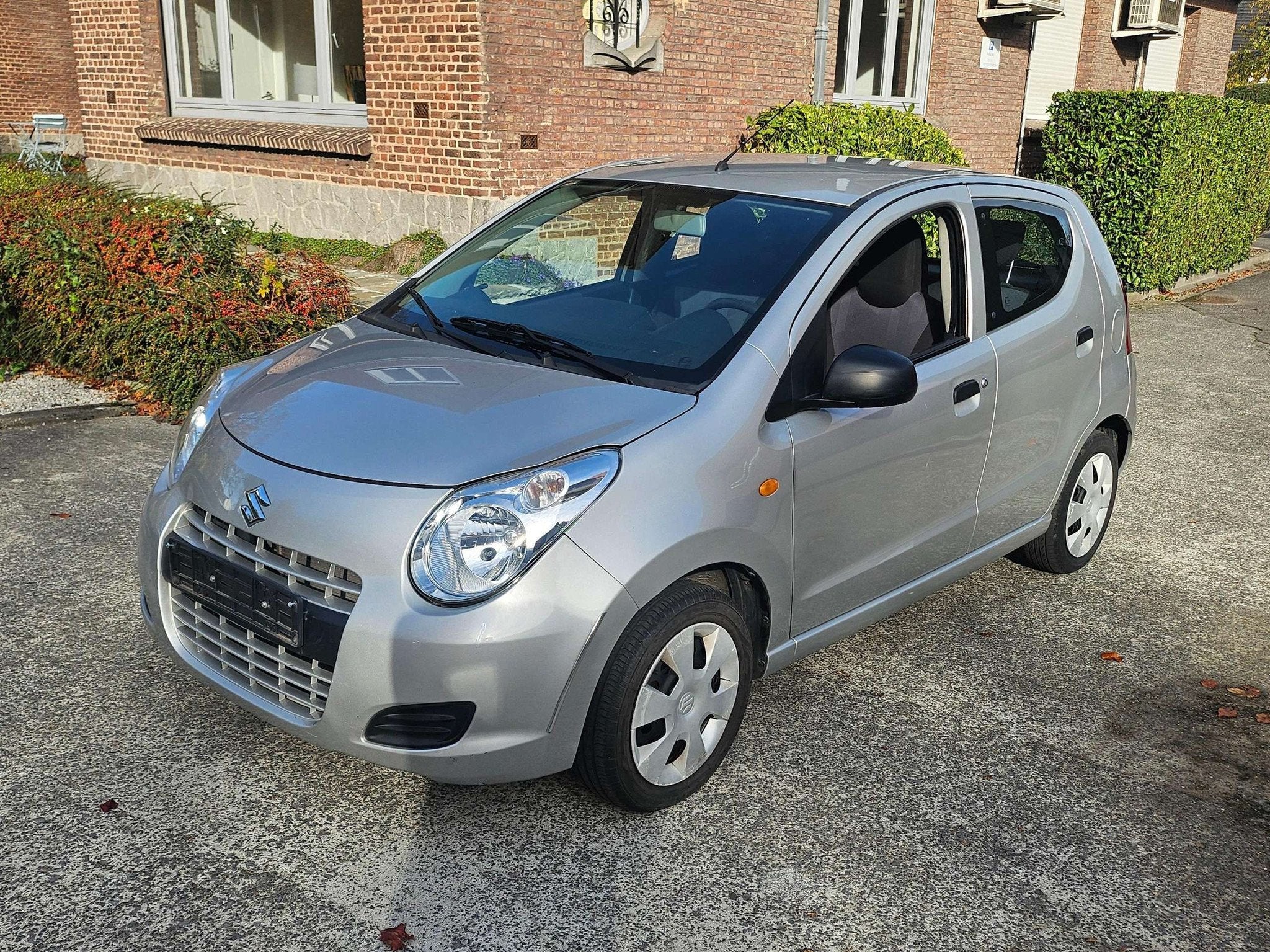 Suzuki Alto Alto 1.0i Airco (bj 2011), Auto's, Voorwielaandrijving, 4 zetels, Stof, Zwart