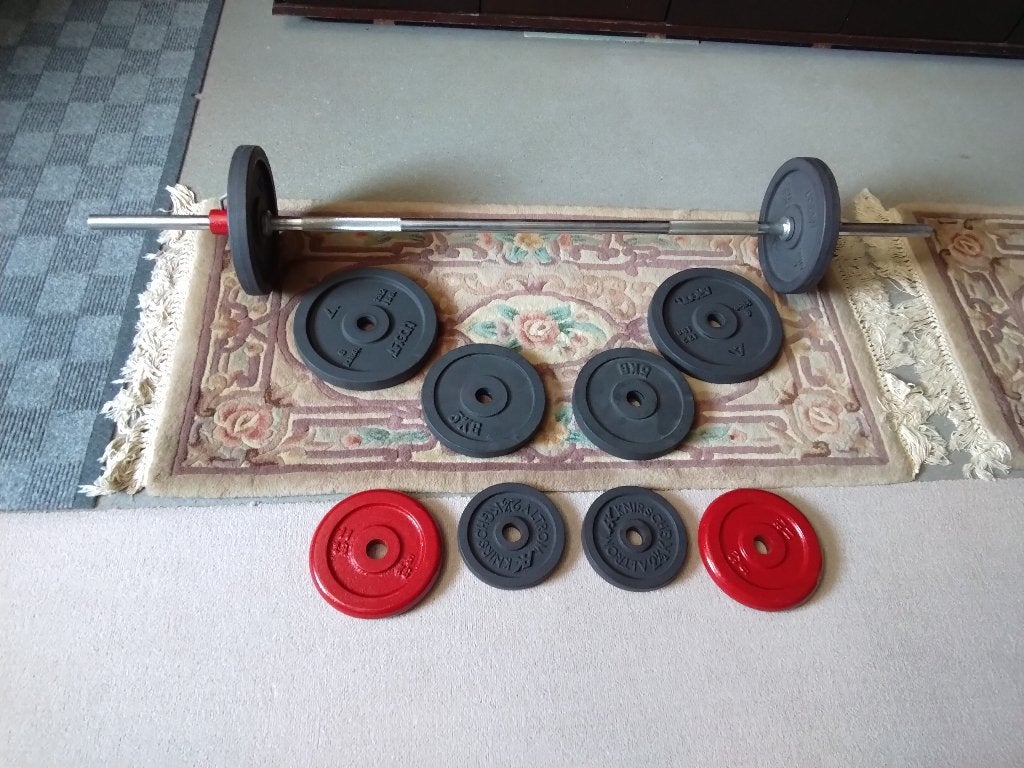 vol ijzeren schijven en lange stang, Sport en Fitness, Ophalen, Gebruikt, Benen, Halterschijven