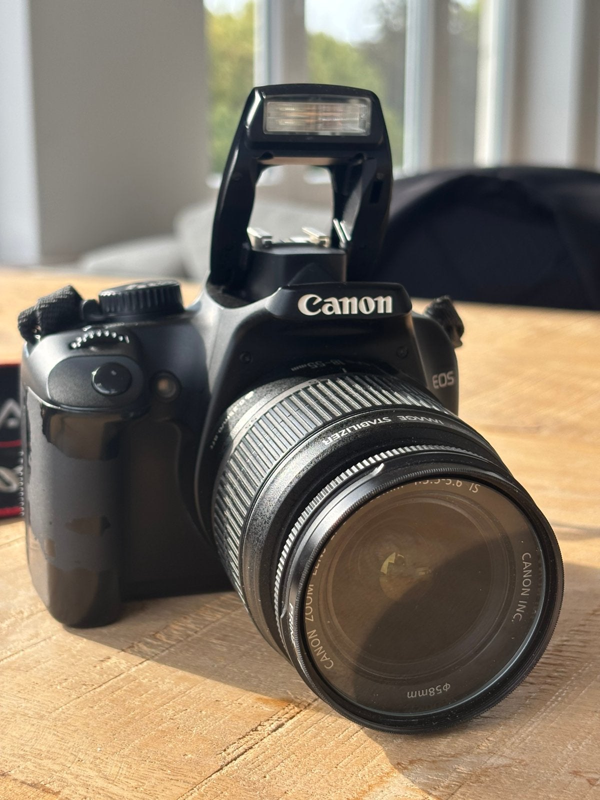 Canon 1000D met Canon 18-55mm IS lens en 2 extra batterijen, Ophalen of Verzenden, Gebruikt, Canon