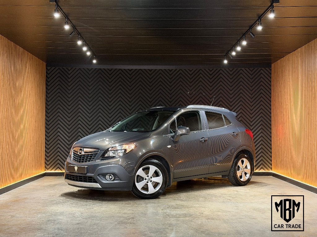 ✅Opel Mokka 1.6i GARANTIE Airco Navi CruiseC Parksensor 1Eig, Auto's, Dealer onderhouden, Stof, 4 cilinders, 5 deurs