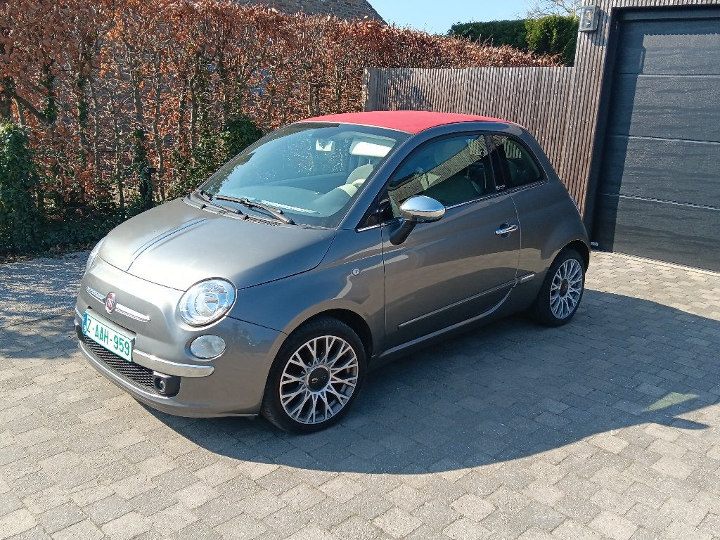Fiat 500 cabrio 1.2cc benz met airco en garantie, Auto's, Voorwielaandrijving, 4 cilinders, Cabriolet, Leder en Stof
