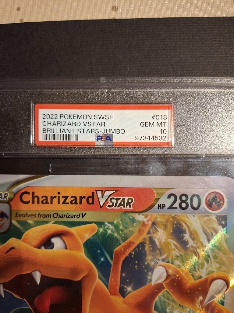 Pokémon PSA 10 Jumbo Charizard Vstar, Hobby en Vrije tijd, Ophalen of Verzenden, Nieuw, Losse kaart, Foil