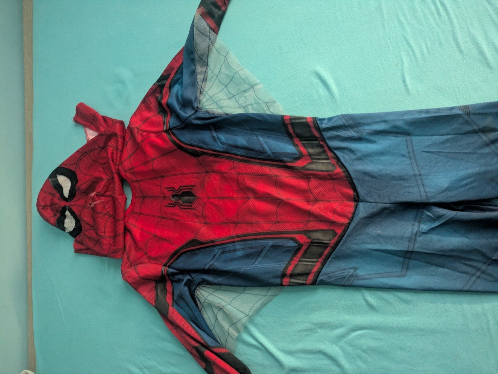 Spiderman kostuum, Ophalen