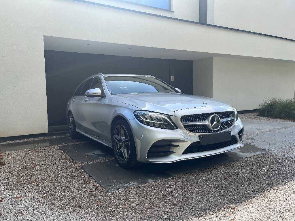 Mercedes C180 d met AMG pakket(trekhaak), Achterwielaandrijving, 1800 kg, Leder, 5 deurs