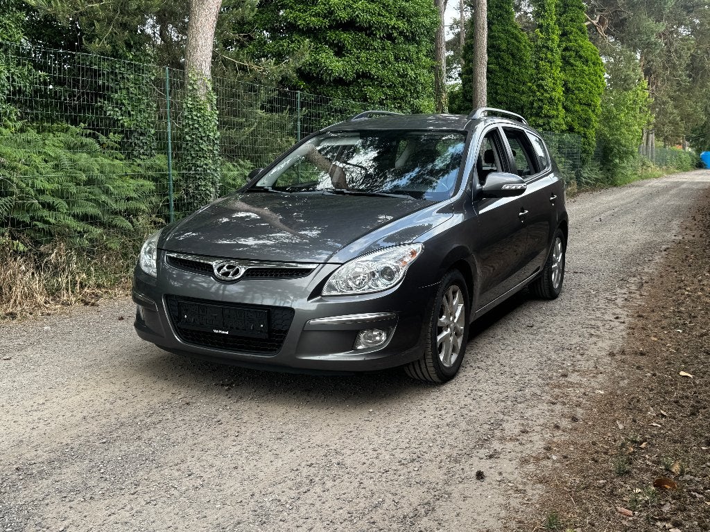 Hyundai i30 cw 1.6 crdi, Auto's, Voorwielaandrijving, 1596 cc, Zwart, 4 cilinders