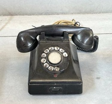 Retro telefoon met draaischijf, Enlèvement