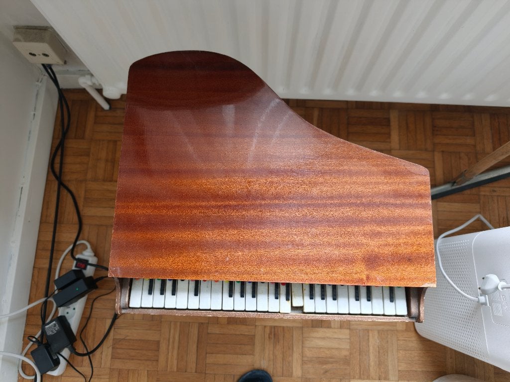 Kleine pianotafel, Ophalen