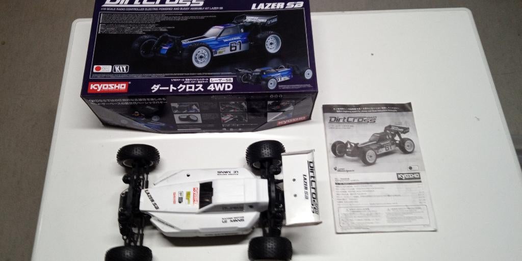 Kyosho dirtcross met wisselstukken, Gebruikt, Auto offroad, Schaal 1:10, Ophalen