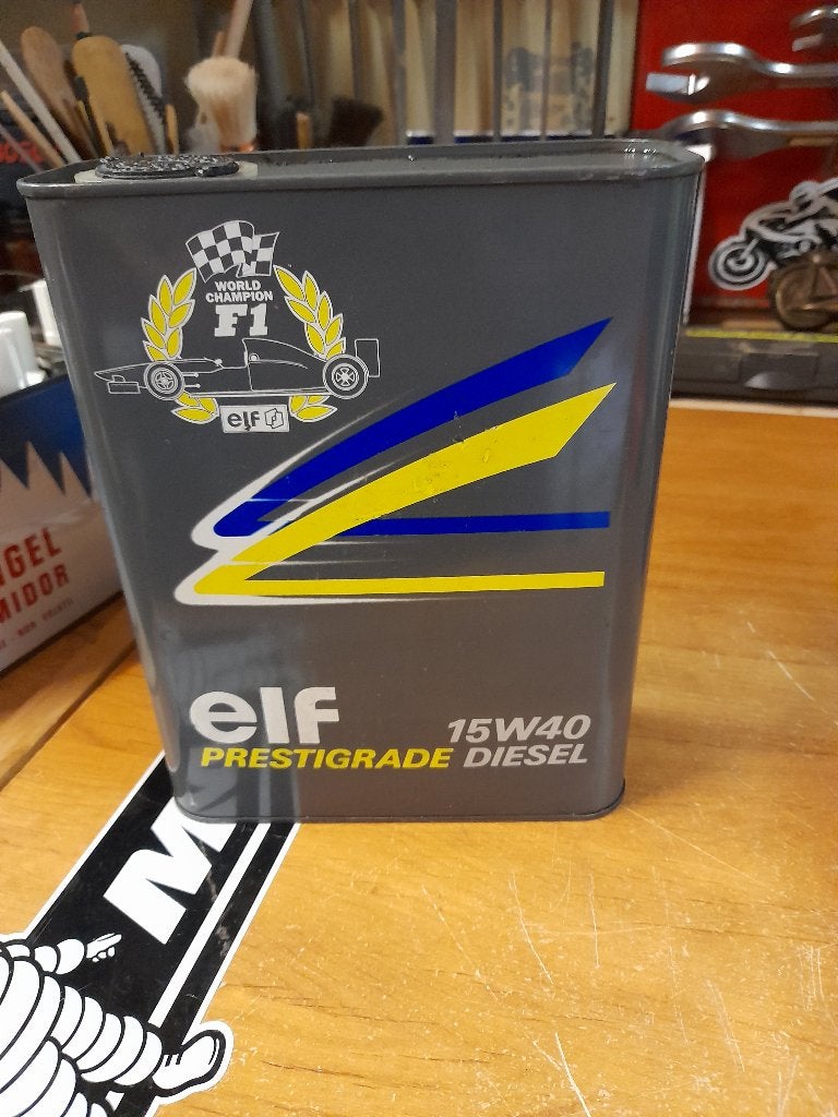 oude lege oliekan elf 15w40 diesel grande f1, Ophalen of Verzenden, Gebruikt, Overige typen