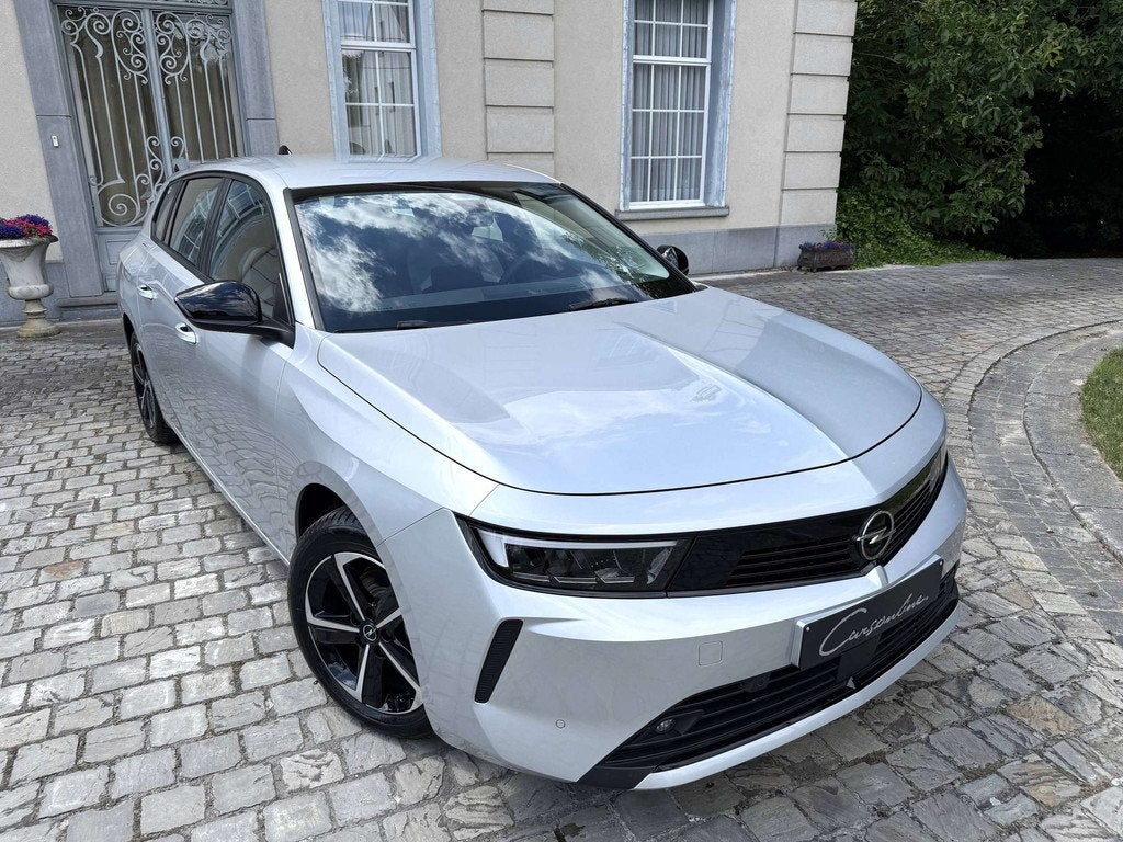 Opel Astra Sports Tourer 1.2 Turbo Edition S/S *Als Nieuw*, Auto's, Gebruikt, https://public.car-pass.be/vhr/c8d74ff3-3284-4ce2-ad90-eb24883b4191