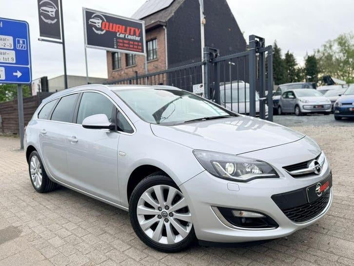 Opel Astra Sports Tourer 2016 125dkm 1.4i Euro6b Xenon Leder, Autos, Opel, Cuir, Argent ou Gris, Euro 6, Entreprise
