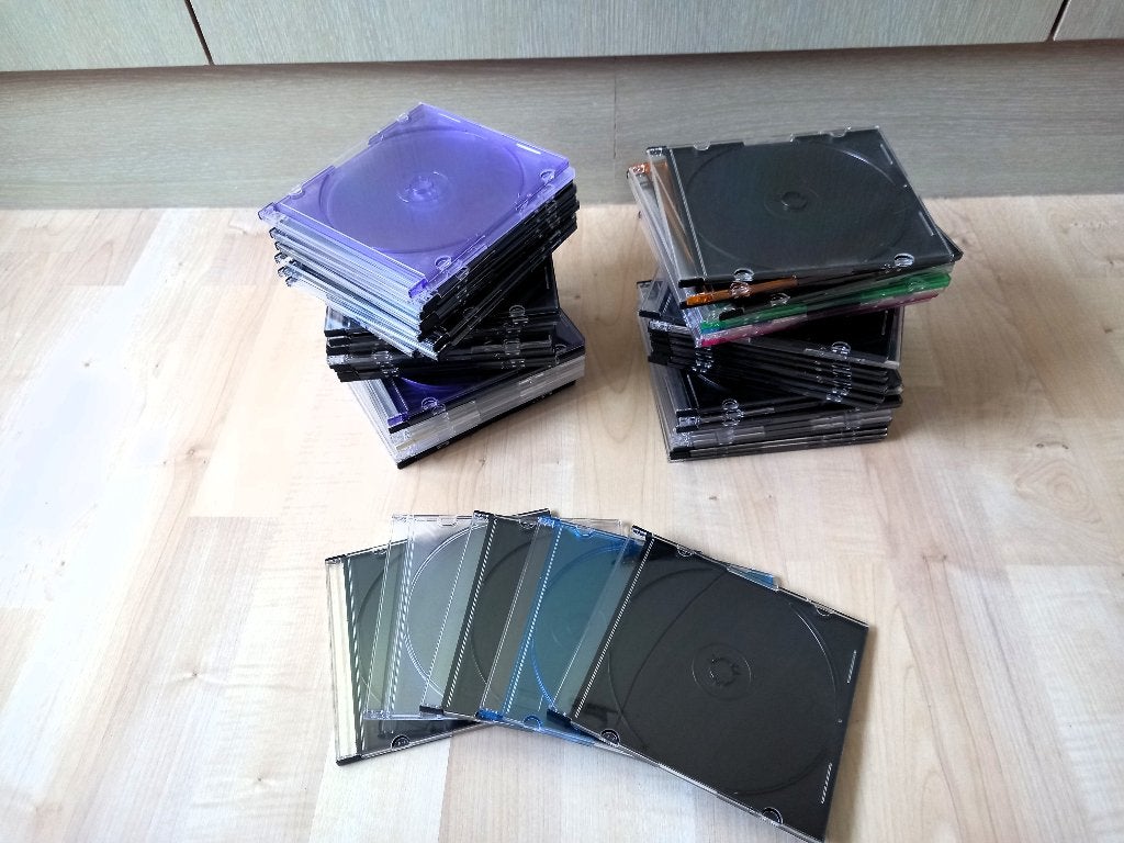 65 lege CD-hoesjes, Computers en Software, Ophalen of Verzenden, Gebruikt, Cd