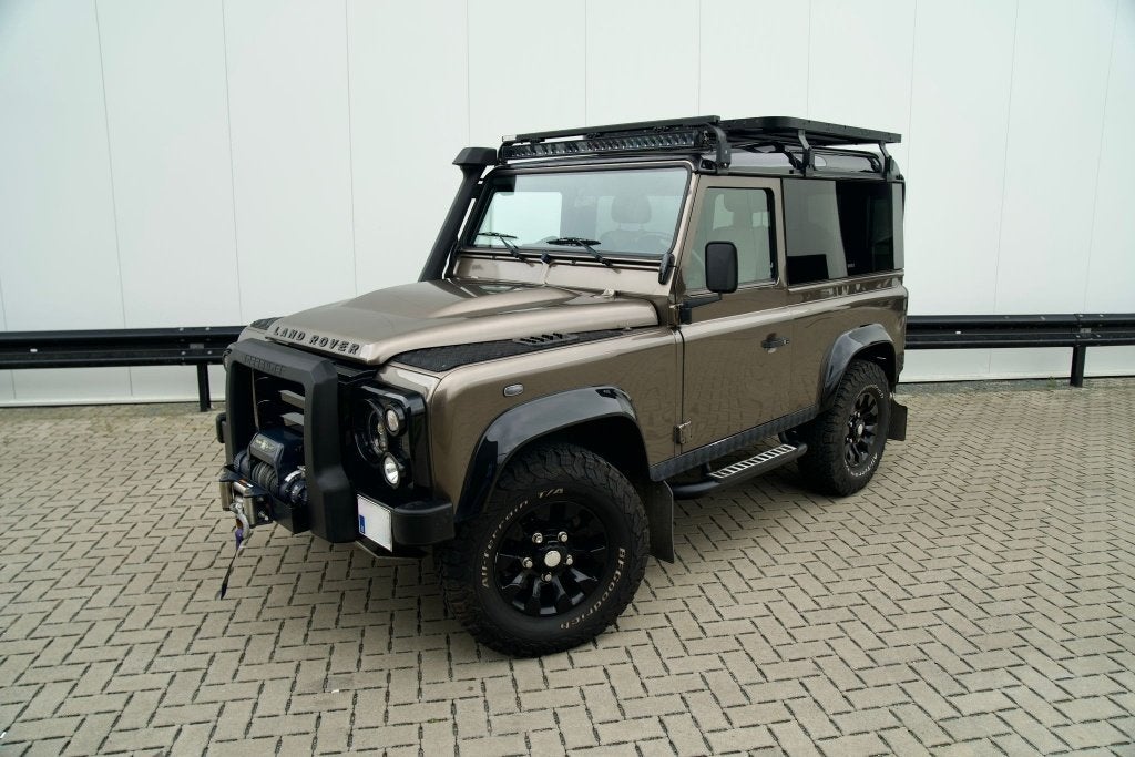 Land Rover Defender 90 - lichte vracht, Auto's, Land Rover, Automaat, Zwart, 4 cilinders, Leder en Stof