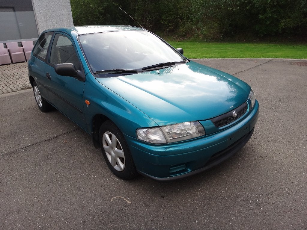 Mazda 323 1.3 Polaris CLIMA 7/1997 1er propriétaire 43709 km, Autos, Achat, Entretenue par le concessionnaire, 5 places, Particulier