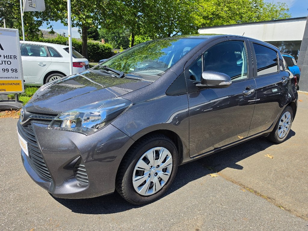 Toyota Yaris 1.33i, 2016, 61.300km, AC, Keuring, 1j Garantie, Auto's, Voorwielaandrijving, Stof, Euro 6, 4 cilinders