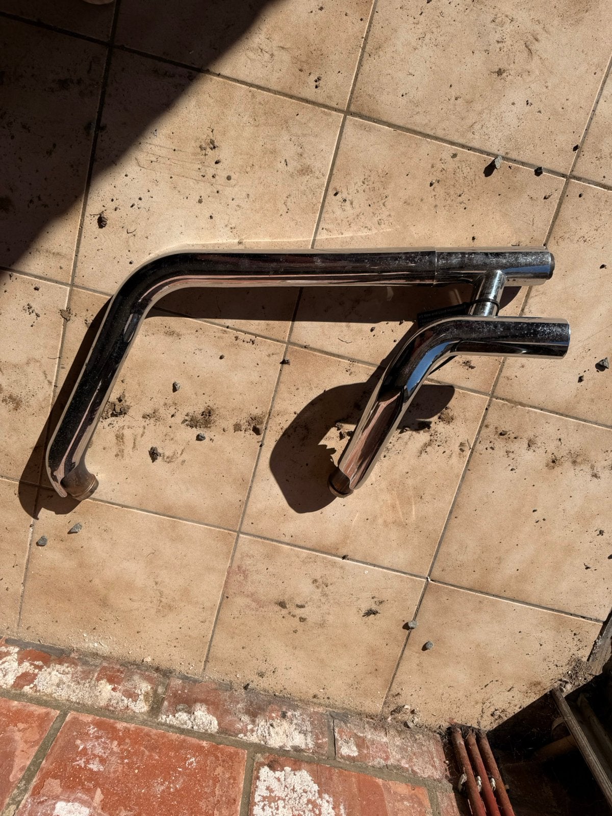 Uitlatenbocht headerpipe softail, Ophalen