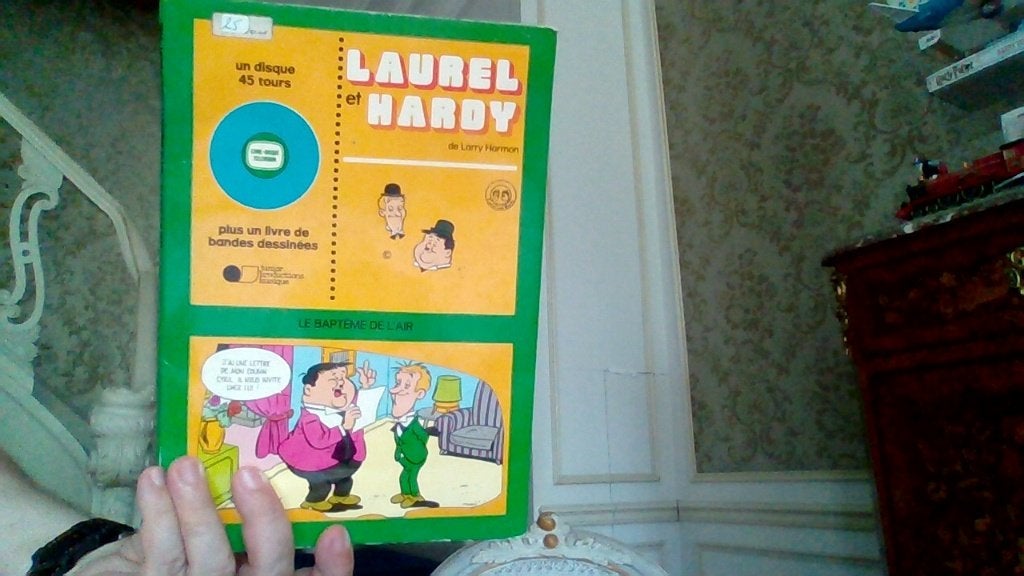 BD laurel et hardy plus disque 45 tours, Antiek en Kunst, Ophalen
