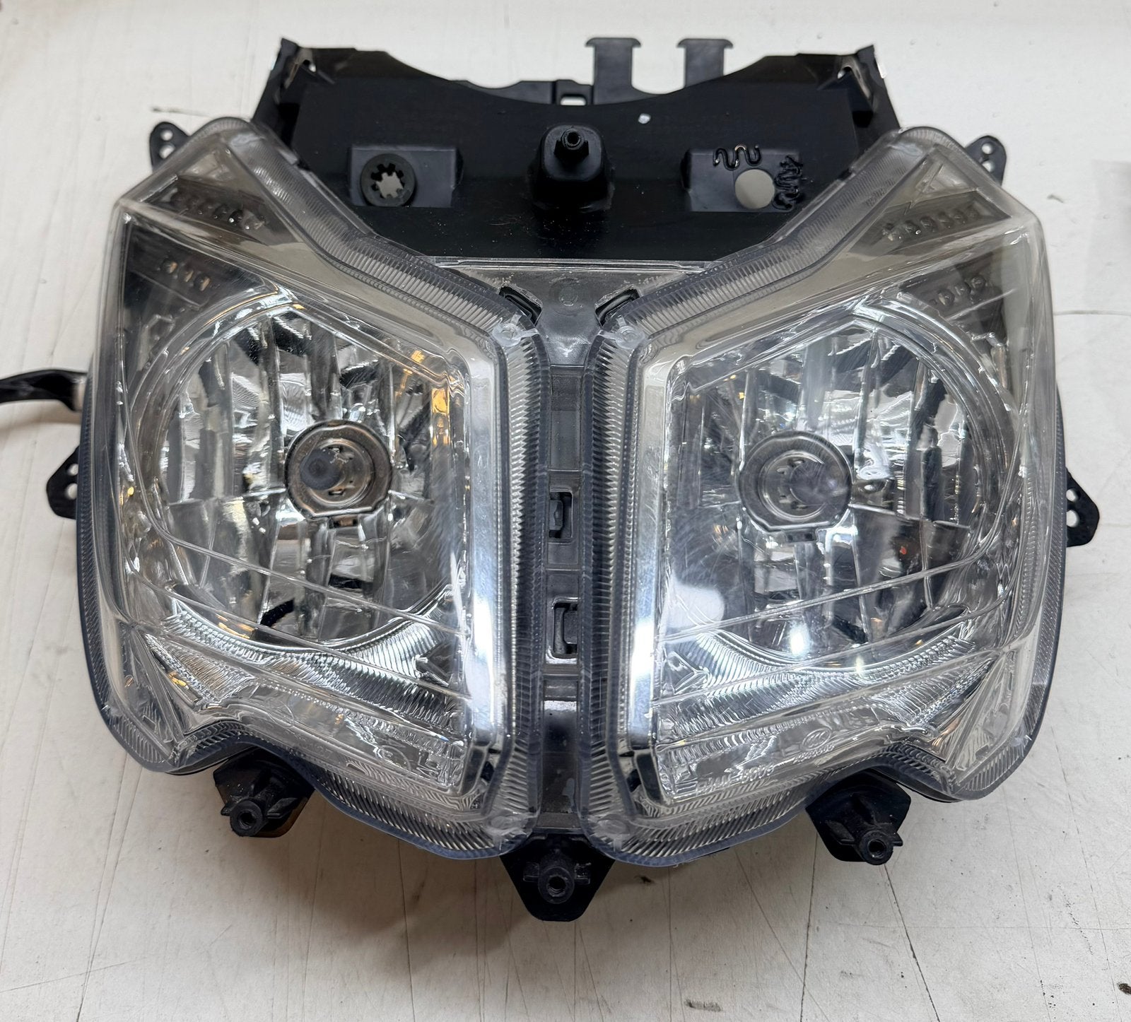 Koplamp hersteld zie foto Sym Jet14, Fietsen en Brommers, Ophalen of Verzenden, Gebruikt, Koplamp, SYM